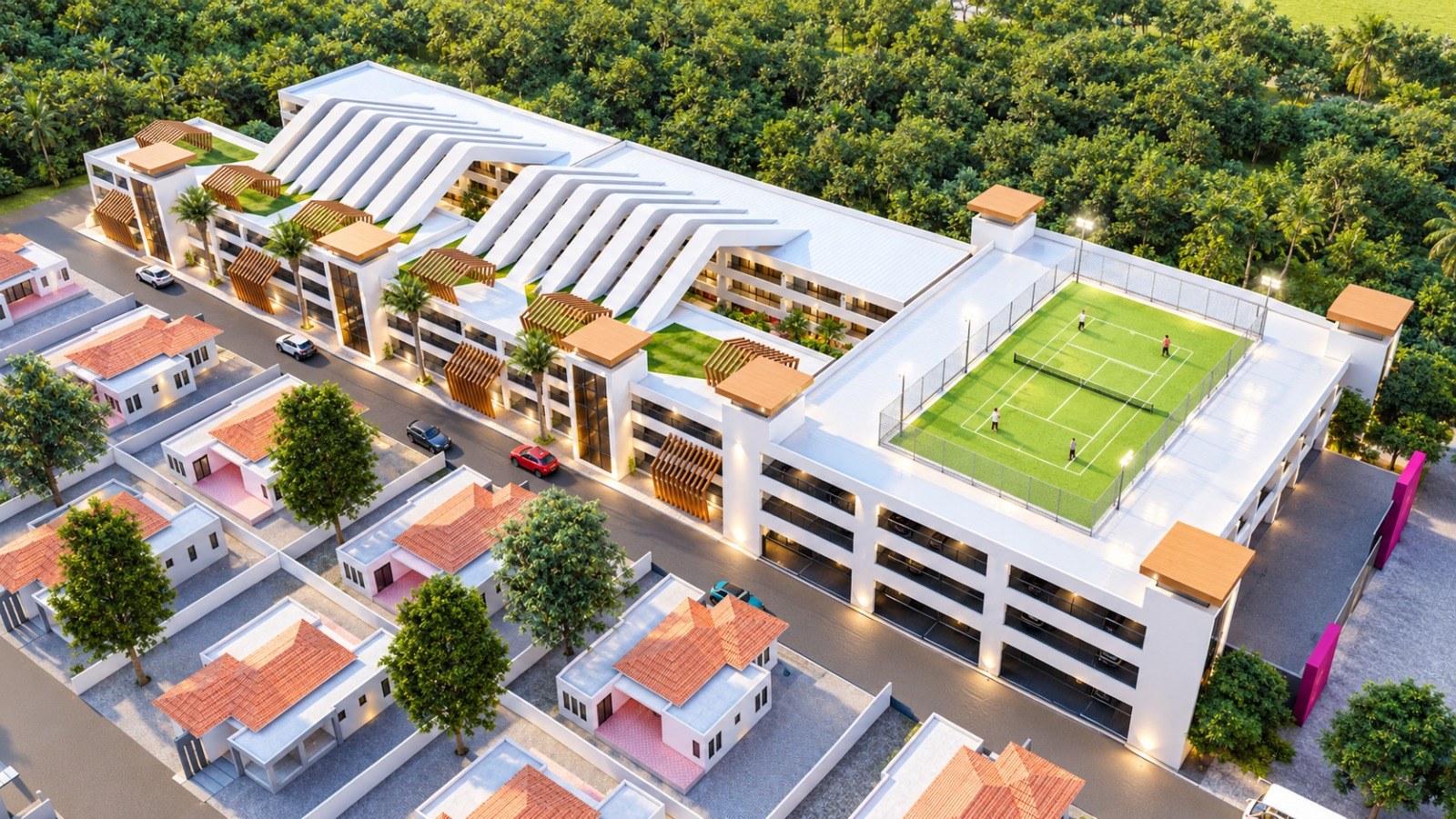 Aerial view of a building with a rooftop padel court beside pink-roofed houses